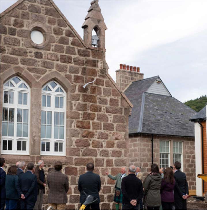 Photo of King Charles unveiling bell at Ballater Old School